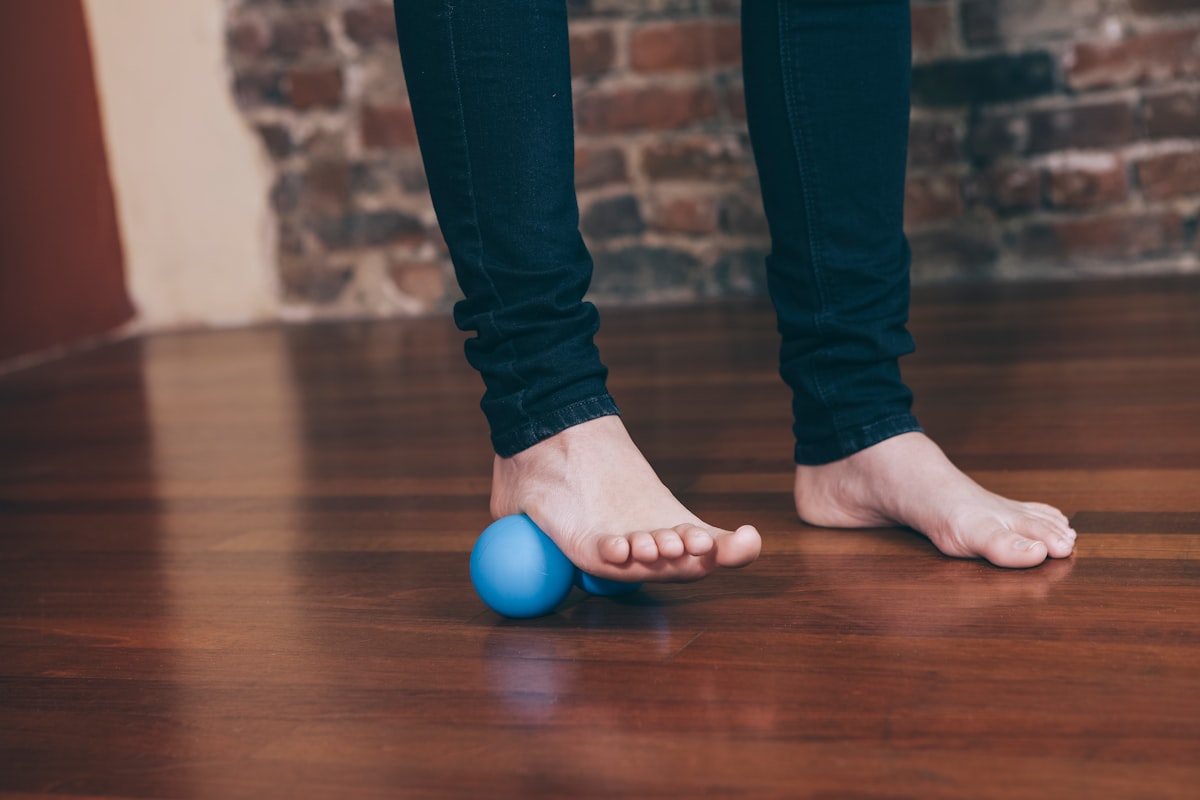 Physiotherapist contributor demonstrating mobility exercises
